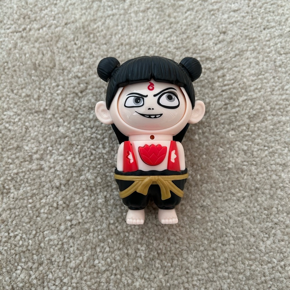 Cute Black and Red Figurine
